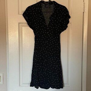 Black and white polka dot collared dress with back tie detail
